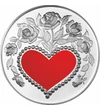 Érem Hátlapja  színes szív ornamentikában
